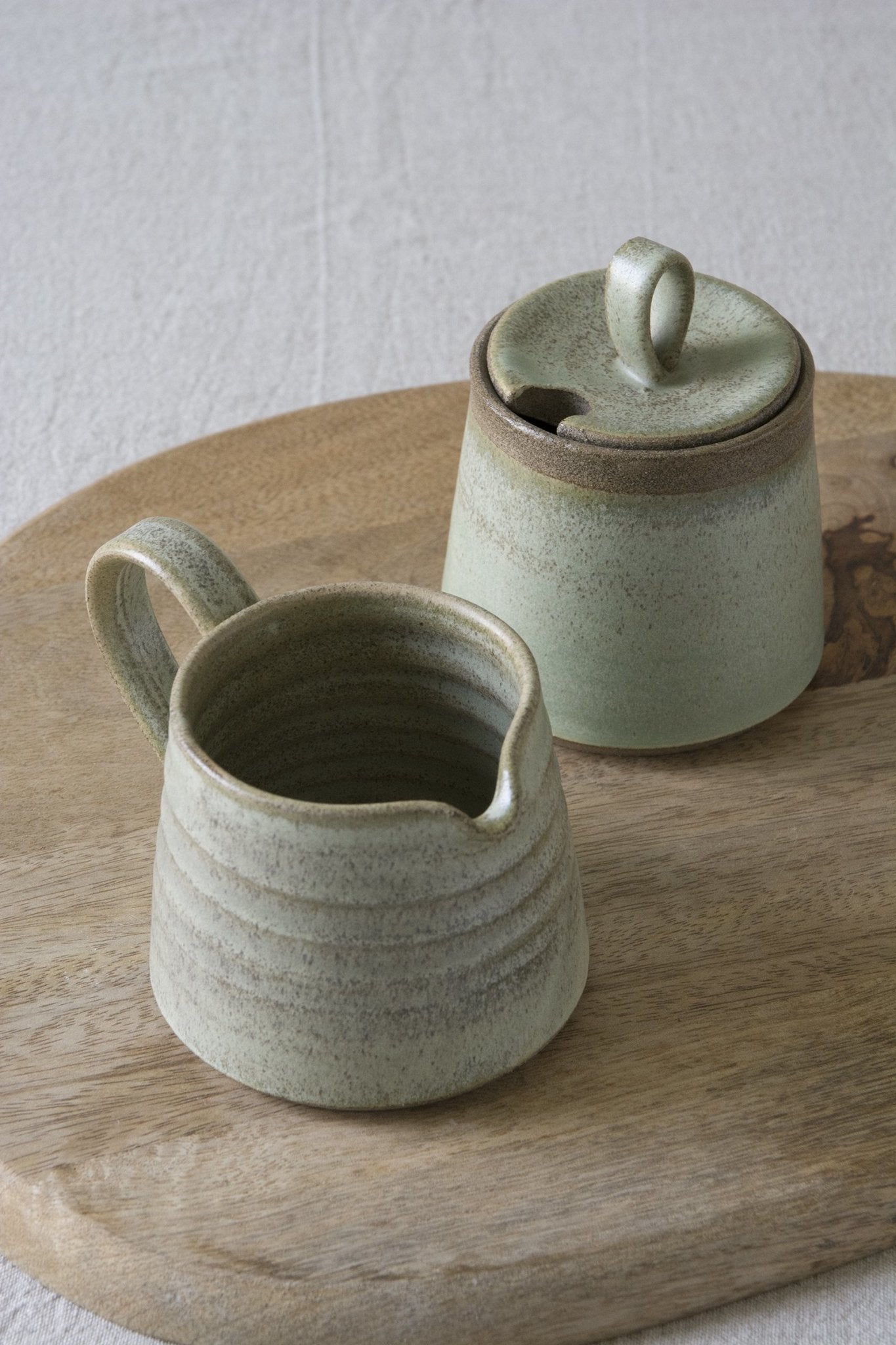 http://www.madaboutpottery.com/cdn/shop/products/green-sage-pottery-sugar-bowl-and-creamer-set-590513.jpg?v=1592124566