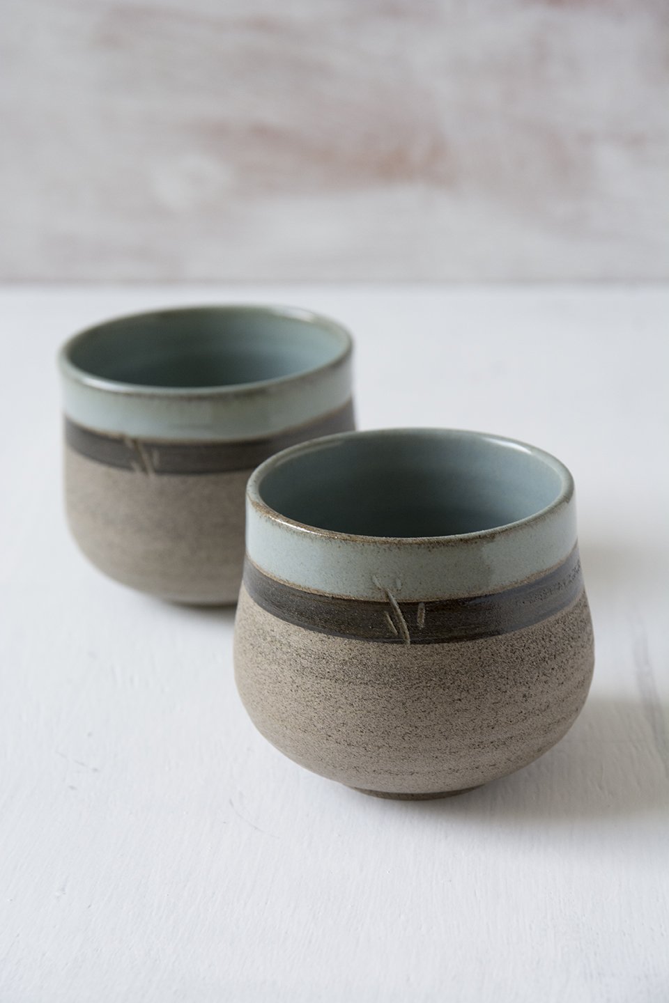 http://www.madaboutpottery.com/cdn/shop/products/light-blue-ceramic-tumblers-set-of-2-955514.jpg?v=1568380455