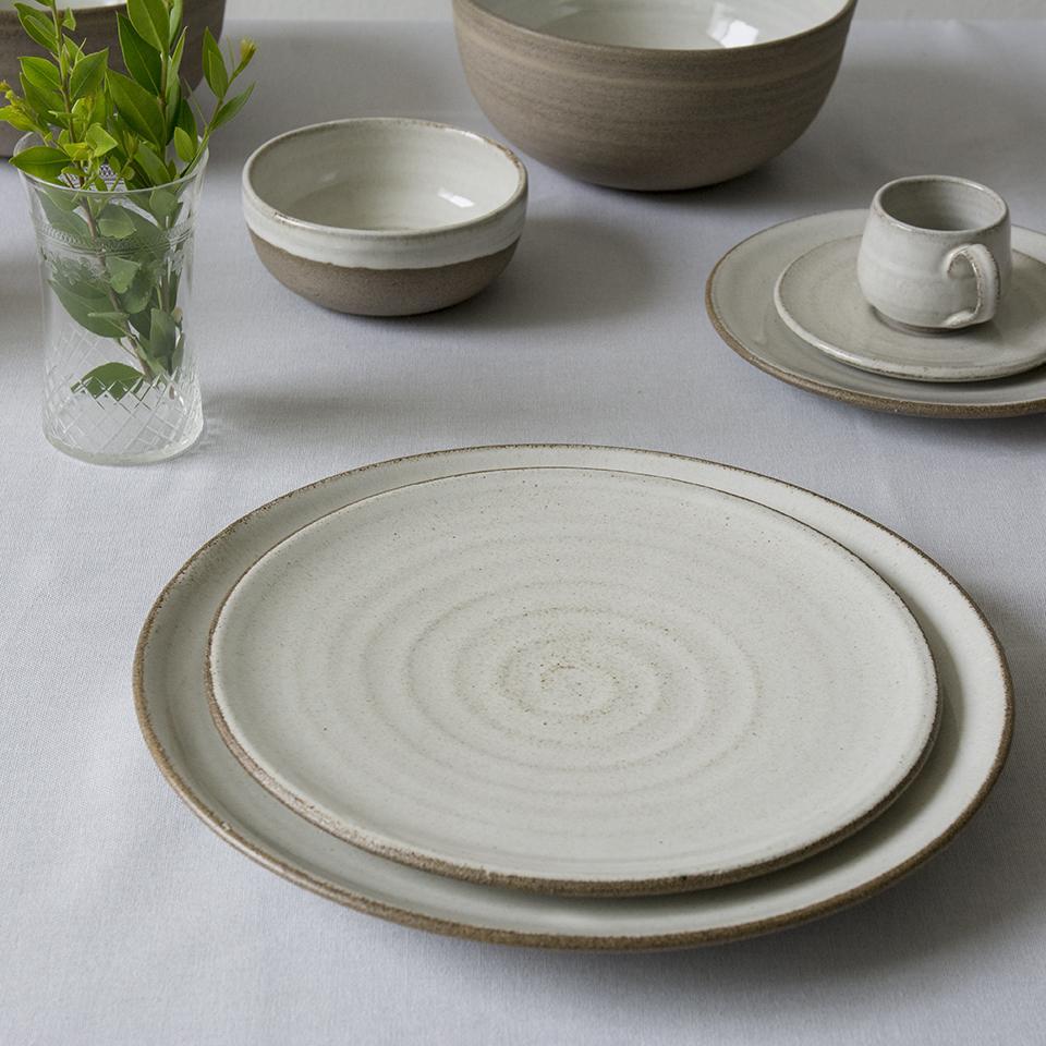 White stoneware shop plates